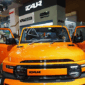 Di sisi lain merek China, iCar, meluncurkan model V23, dan merek Vietnam VinFast luncurkan MPV 7-seater terbarunya Limo Green. Tampak dalam foto, pengunjung melihat iCar V23, kendaraan listrik dari sub-merek produsen mobil Tiongkok, Chery Group, selama Pameran Motor Internasional Indonesia di Jakarta, Sabtu 7 Februari 2026. (AP Photo/Tatan Syuflana)