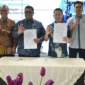 Direktur Kredit dan Syariah Bank Nagari Hafid Dauli bersama Direktur PT Tjahaja Baru Agri Edward Ferry Gani.( poto : padangkita.com )