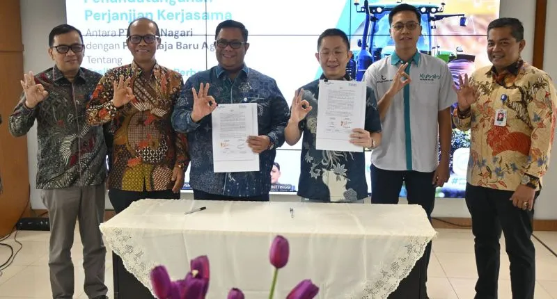 Direktur Kredit dan Syariah Bank Nagari Hafid Dauli bersama Direktur PT Tjahaja Baru Agri Edward Ferry Gani.( poto : padangkita.com )