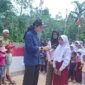 Bupati Annisa Suci Ramadhani memimpin peresmian bersama Danramil 03/Pulau Punjung Letda Inf Magel Hendri yang mewakili Dandim 0310/SSD.( poto : langgam.id )