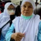 Nurlena (64), pedagang sayur asal Kabupaten Tanah Datar, Sumatera Barat, akhirnya menunaikan ibadah haji setelah menabung selama 13 tahun dari hasil berdagang.( poto : padangkita.com )
