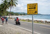 Pemerintah Kota Pariaman memasang 101 ramu evakuasi tsunami Pariaman di sejumlah kawasan pesisir pantai.( ilustrasi poto: AI).