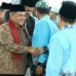 Bupati Agam Beni Warlis bersama Kepala Kantor Wilayah Kementerian Haji dan Umrah Provinsi Sumatera Barat, M. Rifki, saat menghadiri Tasyakuran Haji.(poto: padangkita.com).