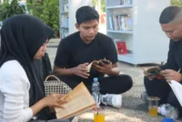 Dinas Perpustakaan dan Kearsipan (Dispusip) Kota Padang menghadirkan taman bacaan luar ruang di halaman kantor.(poto: padangkita.com).