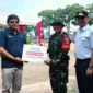 Penyerahan bantuan secara simbolis berlangsung khidmat di Lapangan Kantin Brawijaya 0304/Agam pada Rabu (15/7/2026).(poto: padangkita.com).