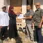 Destimar Irawati ketika menerima kunci rumah layak huni yang dibangun melalui dukungan PT Semen Padang bersama Forum Pemberdayaan Masyarakat (FPM) Kelurahan Baringin.(poto: padangkita.com).