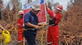 Kementerian Lingkungan Hidup/Badan Pengendalian Lingkungan Hidup (KLH/BPLH) mengambil tindakan tegas dengan menyegel area konsesi PT BHP di Kabupaten Ogan Komering Ilir, Sumatera Selatan.(poto: kompas.com).