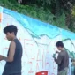 Warga Mata Air Padang sulap trotoar jadi kanvas lewat lomba mural. Ajang kreatif ini angkat pesona pariwisata lokal sekaligus memeriahkan HUT ke-81 RI.(poto: padangkita.com).