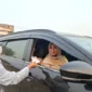 BRI BO Dharmasraya turun ke jalan bagikan masker gratis. Langkah nyata bantu warga terlindungi dari gangguan pernapasan.(poto: padangkita.com).