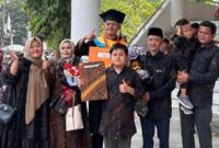 Sahal Maghfud lulusan UNJA raih cumlaude IPK 3,98 dari prodi Sistem Informasi.(poto: unja.ac.id).