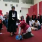 TP PKK Padang dan PERKI Sumbar menggelar pelatihan Bantuan Hidup Dasar massal untuk membekali warga pertolongan pertama henti jantung.(poto: padangkita.com).