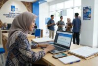 Pelamar menyiapkan berkas di depan laptop saat registrasi daring Dosen Tetap Non-PNS ITS 2026.(ilustrasi poto: AI).